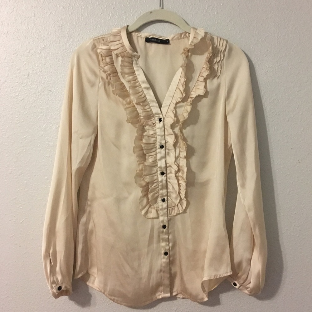 Ruffled tuxedo style blouse